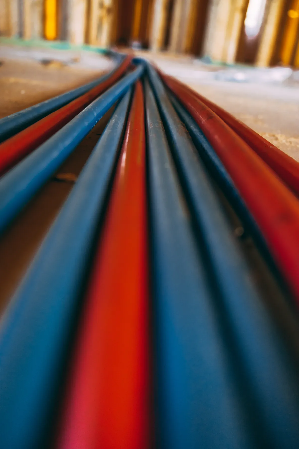 Coiled red and blue PEX tubing ready for a repipe – Rinnai Tankless Water Heater Installation Guide for Irvine Homeowners for Irvine, CA homes
