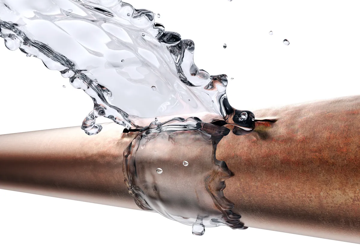Water splashing from a corroded copper pipe – Leak Detection Orange County Guide for Irvine Properties for Irvine, CA homes